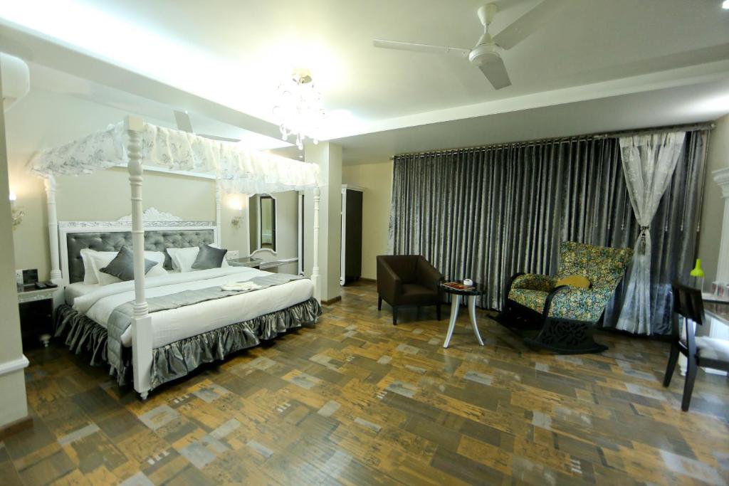 Postel nebo postele na pokoji v ubytování Hotel President