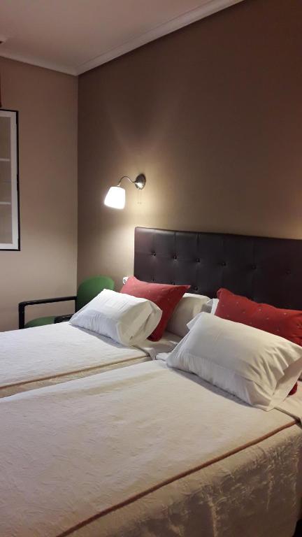Postel nebo postele na pokoji v ubytování Hostal Martin - Sanabria