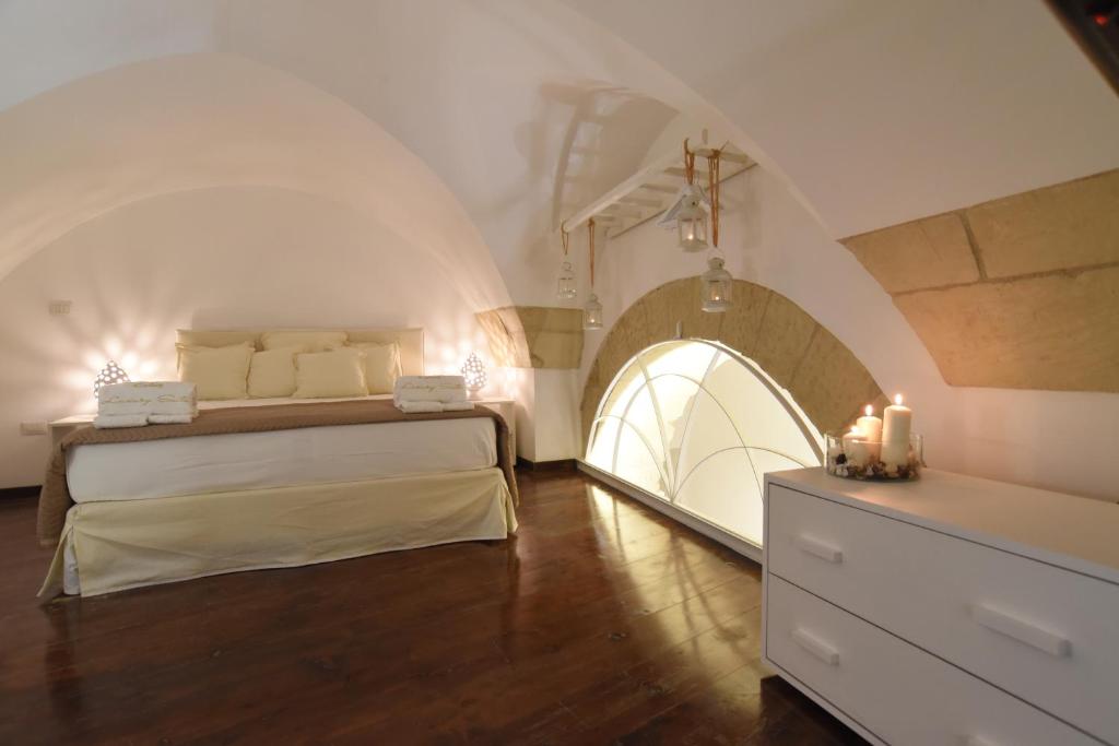 Postel nebo postele na pokoji v ubytování Cadelli Luxury Suite & Apartments