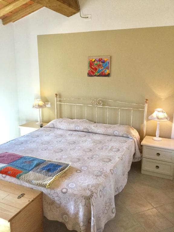 Postel nebo postele na pokoji v ubytování B&B Alloro