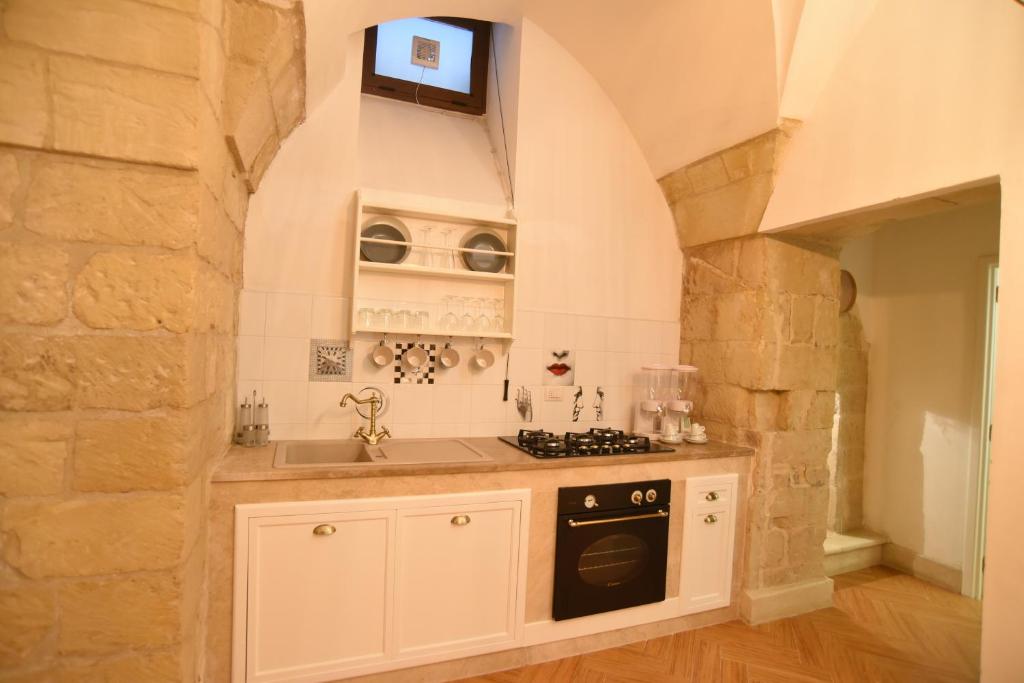 Kuchyň nebo kuchyňský kout v ubytování Cadelli Luxury Suite & Apartments