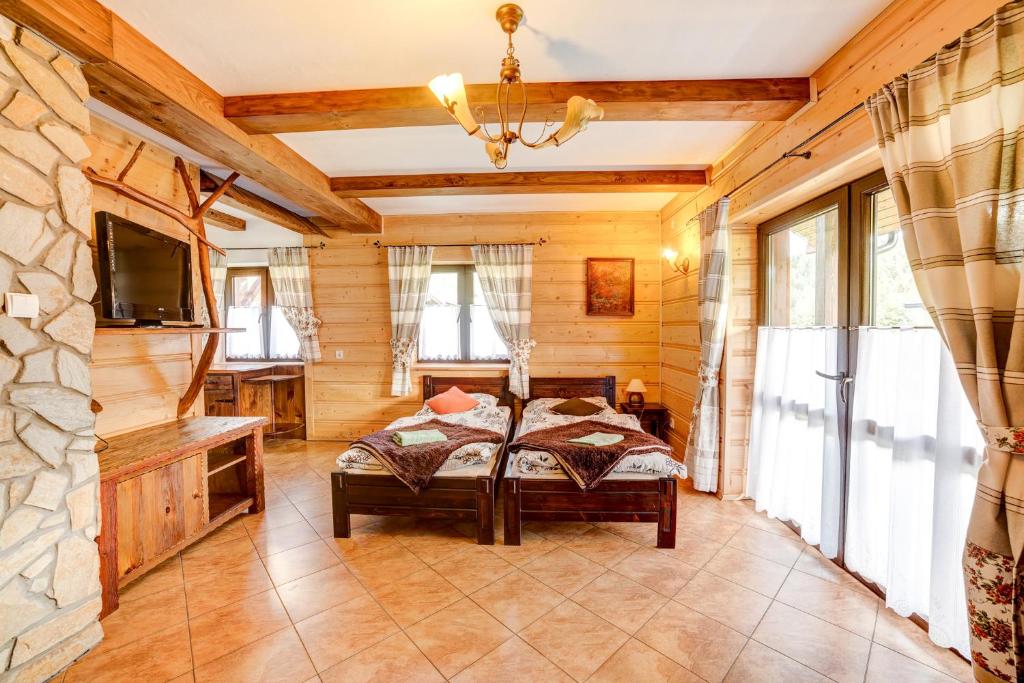 Postel nebo postele na pokoji v ubytování Solny - Resort w Bieszczadach