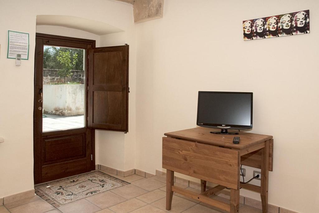 TV a/nebo společenská místnost v ubytování Agriturismo Capani
