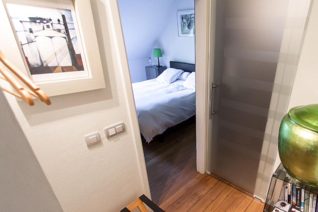 Postel nebo postele na pokoji v ubytování B&B Le Bois Dormant