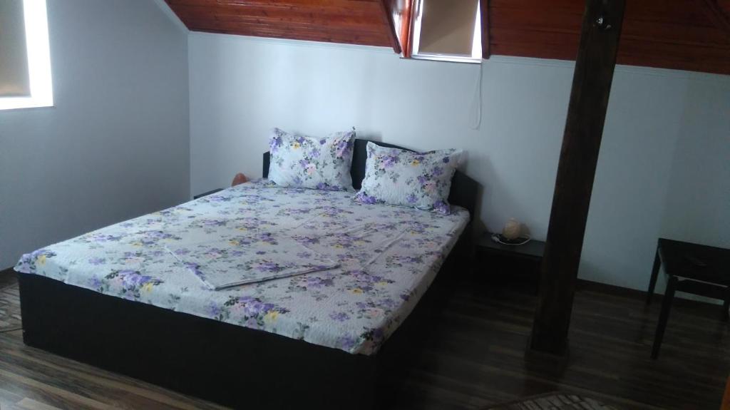 Postel nebo postele na pokoji v ubytování Zoi Residence