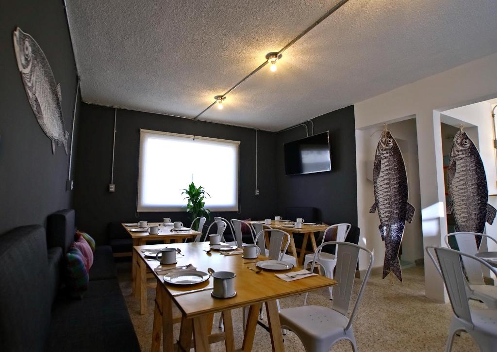 TV a/nebo společenská místnost v ubytování Mas Basico Hotel