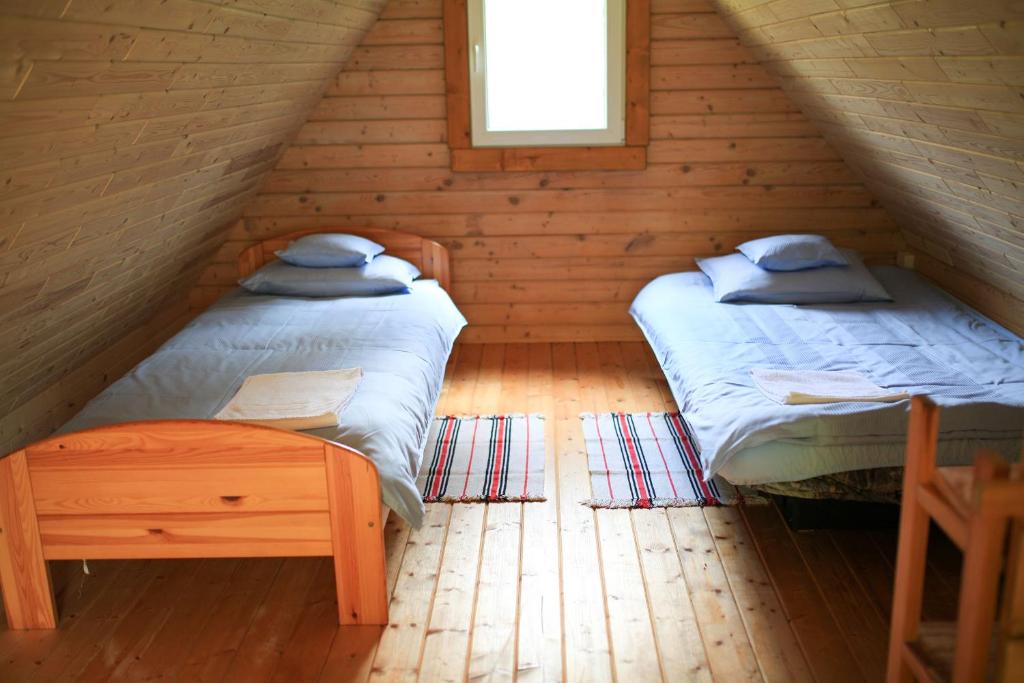 Postel nebo postele na pokoji v ubytování Mazurja