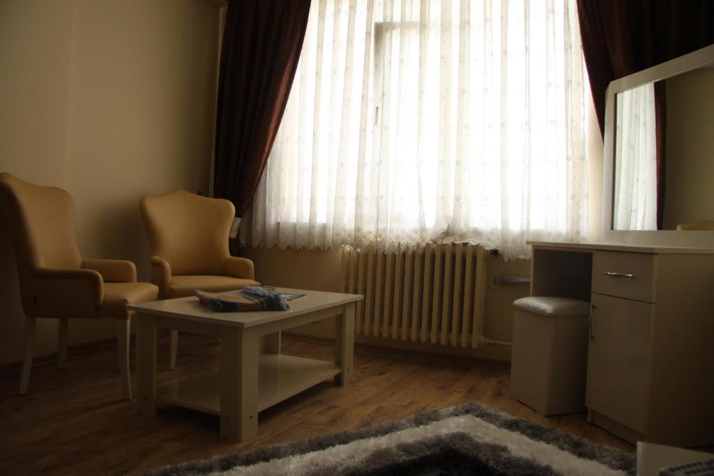A seating area at Cmr Aydogan Hotel