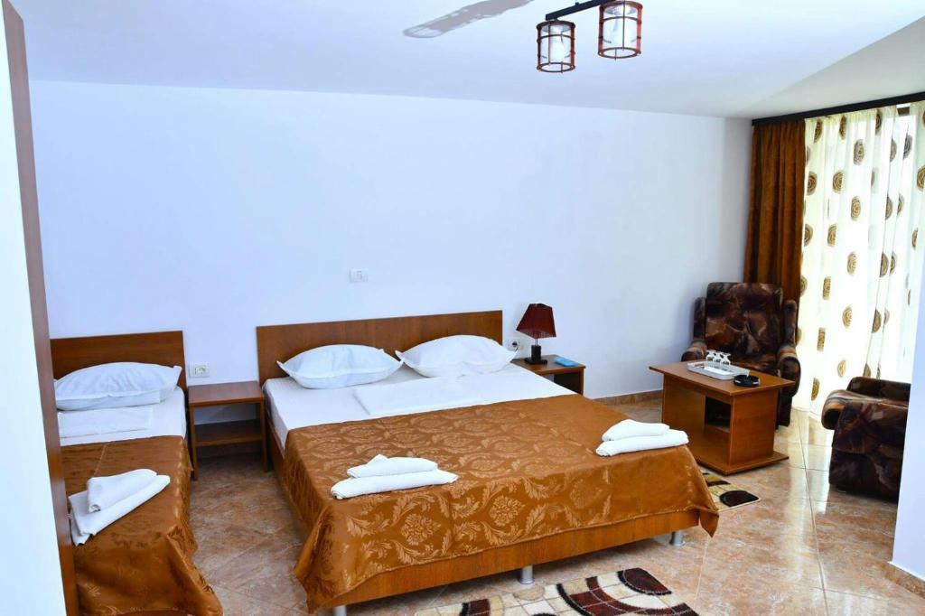 A bed or beds in a room at Casa Kmy