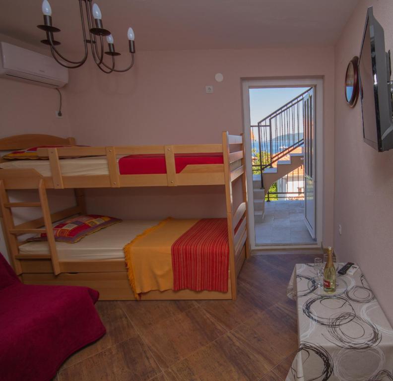 Postel nebo postele na pokoji v ubytování Apartments Bellavista
