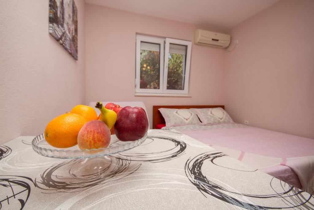Postel nebo postele na pokoji v ubytování Apartments Bellavista