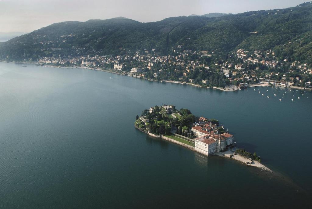 an island in the middle of a large body of water at MONOLOCALE lago maggiore INTRA in Verbania