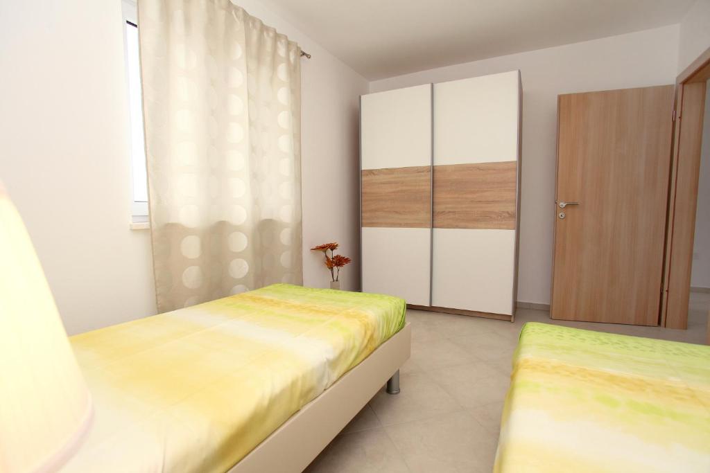 Posteľ alebo postele v izbe v ubytovaní Villa Lanterna