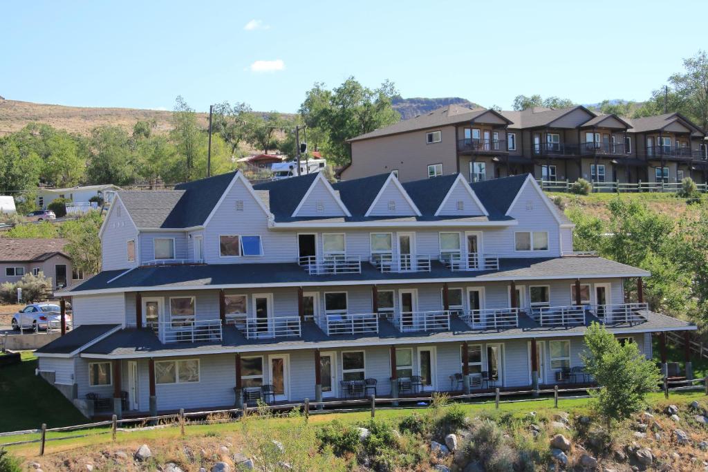 a large house with solar panels on top of it at Absaroka Lodge in Gardiner