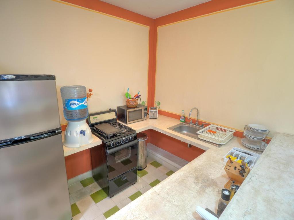 Kuchyň nebo kuchyňský kout v ubytování Hotel Luz en Yucatan