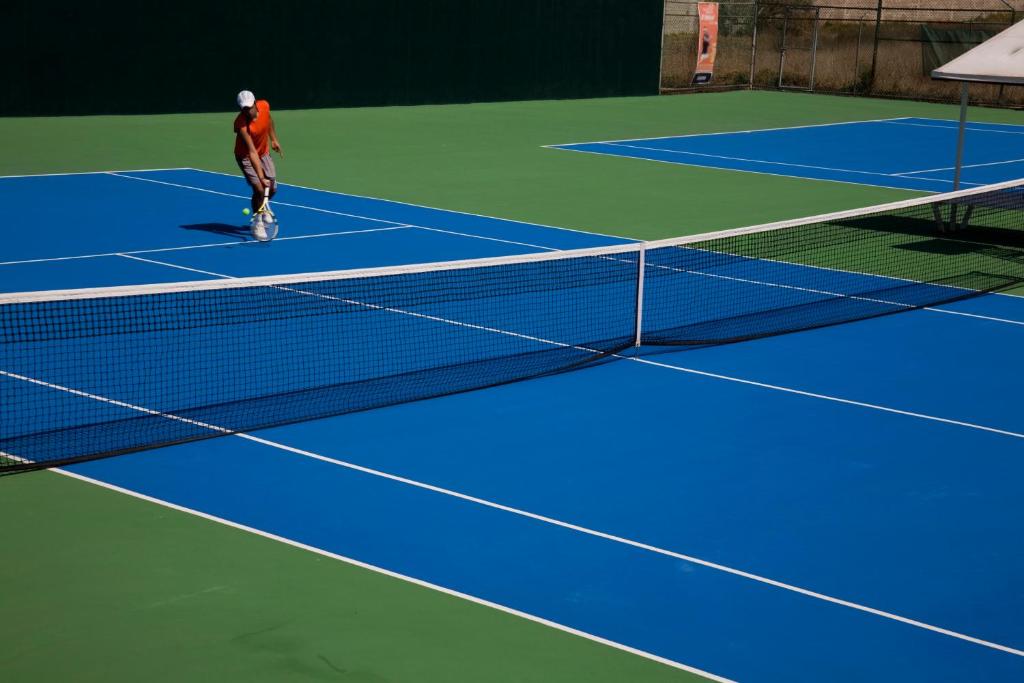 Tenis a/nebo squash v ubytování Hotel La Joya Tulancingo nebo okolí