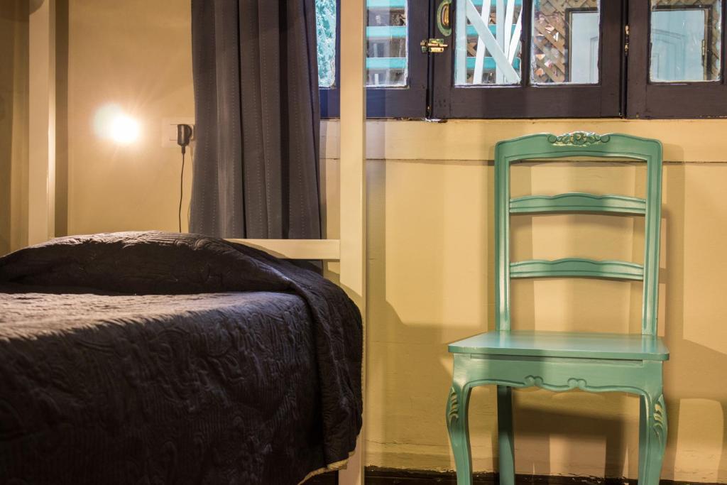 Palanda nebo palandy na pokoji v ubytování Hostal Forestal