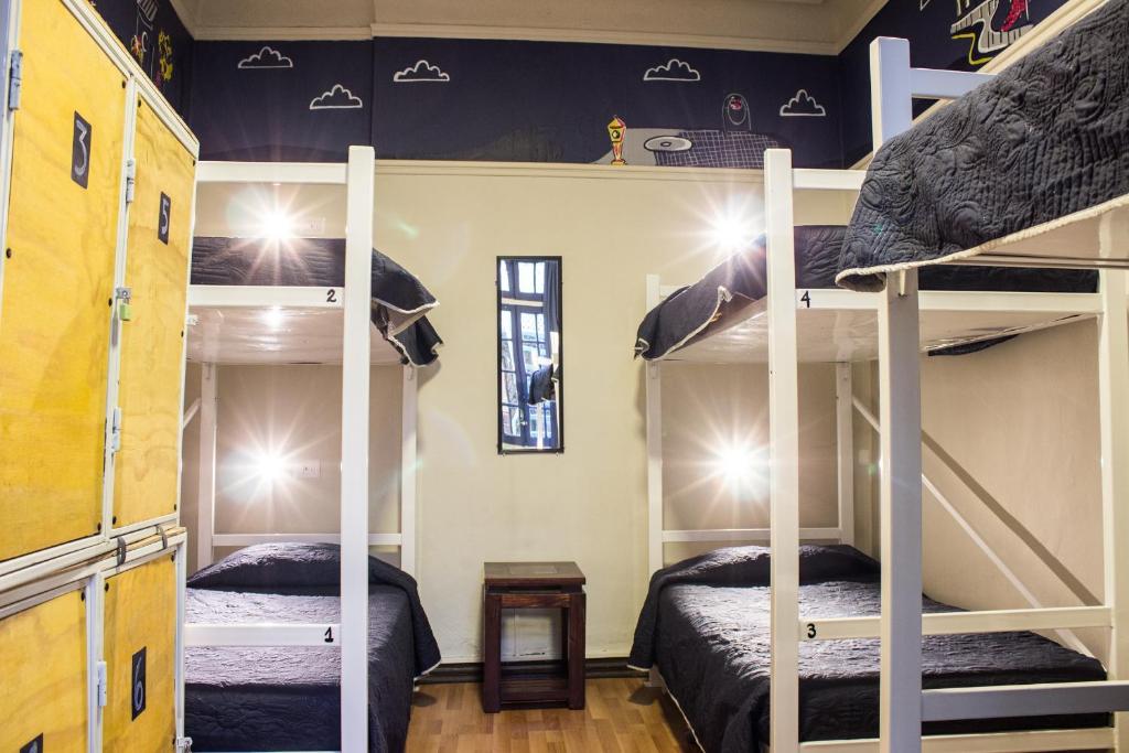 Postel nebo postele na pokoji v ubytování Hostal Forestal