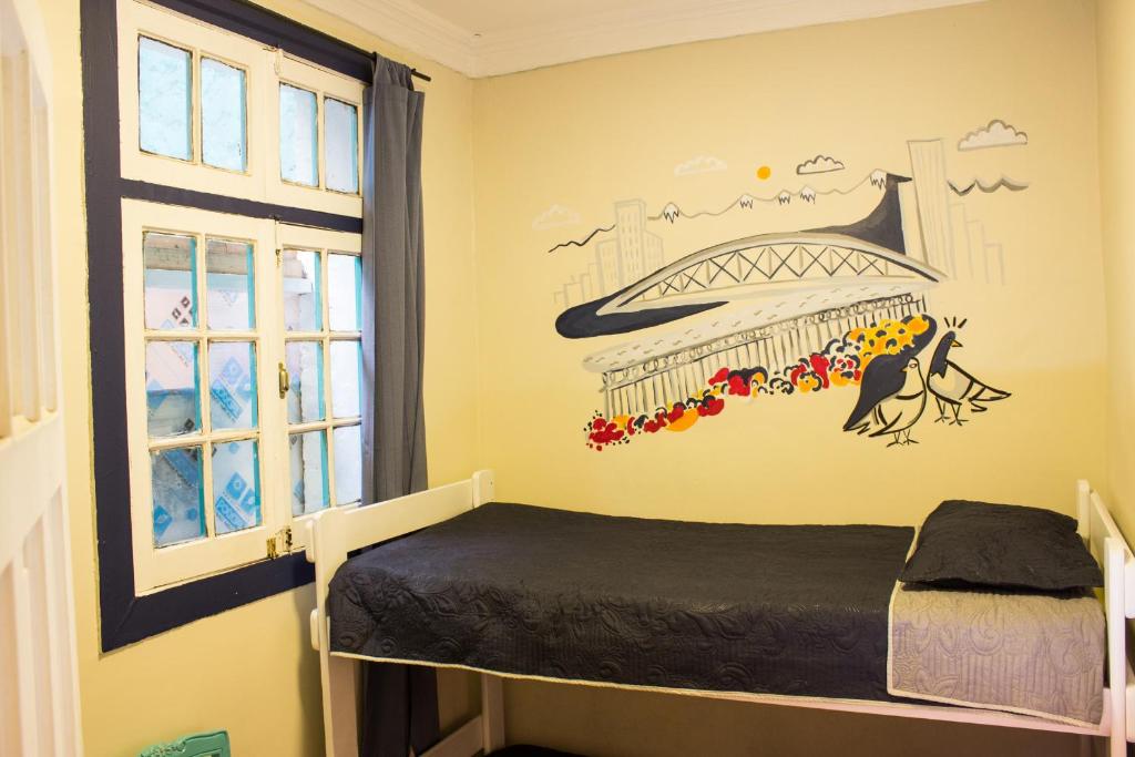 Postel nebo postele na pokoji v ubytování Hostal Forestal