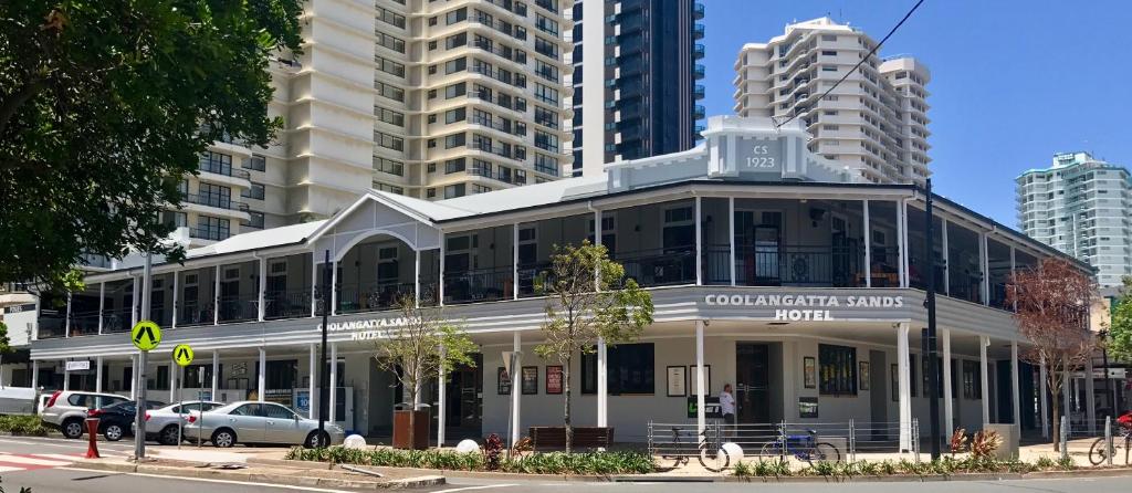 
a large building with a lot of windows on the side of it at Coolangatta Sands Hotel in Gold Coast
