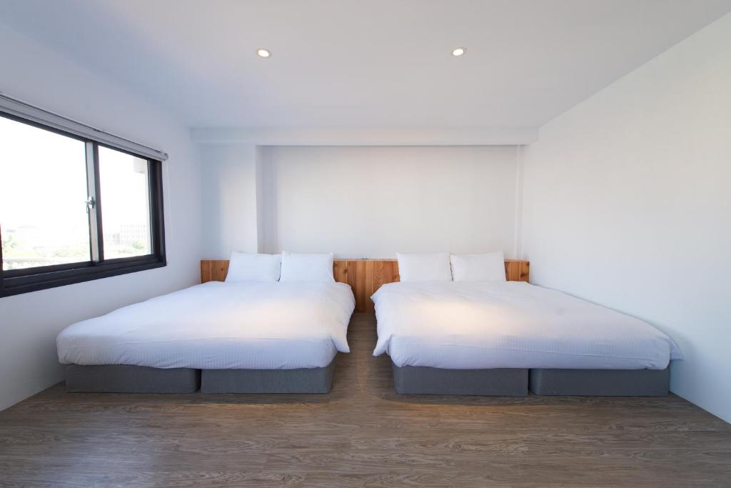 Traveller Inn TieHua Cultural and Creative Hotel - 四倍房间