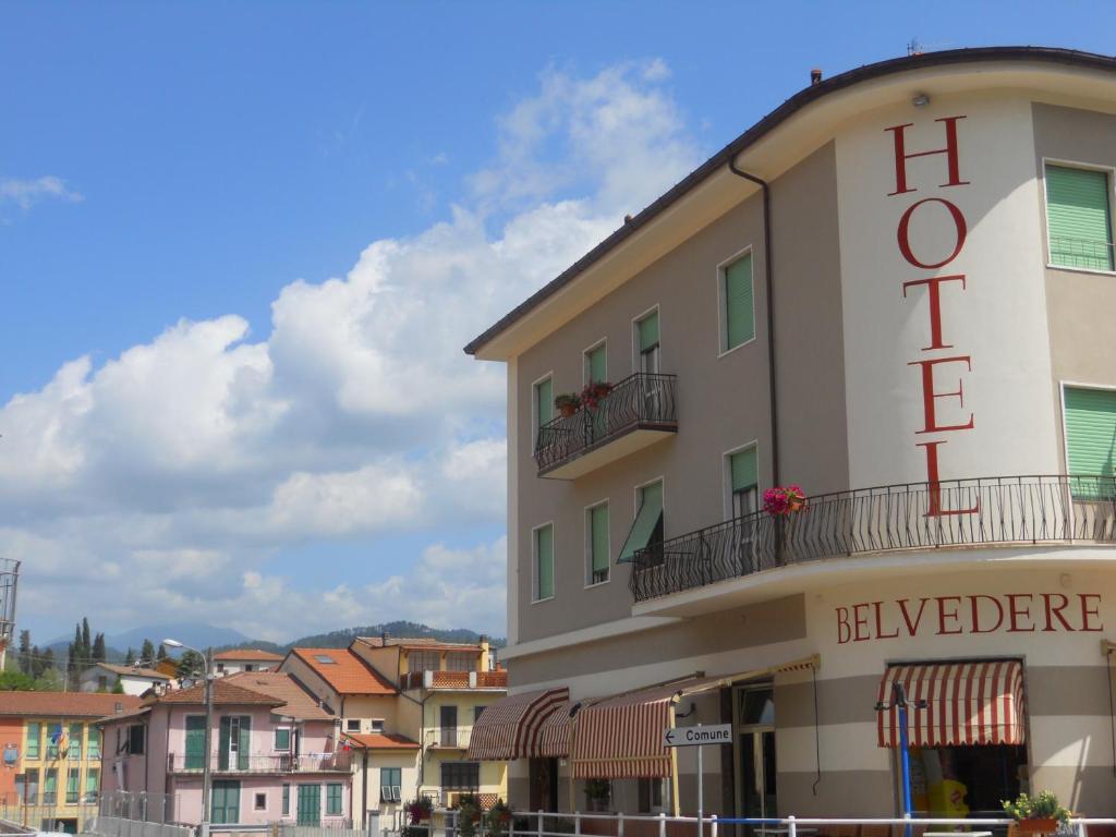 a hotel with a sign on the side of it at Albergo Belvedere in Borghetto di Vara