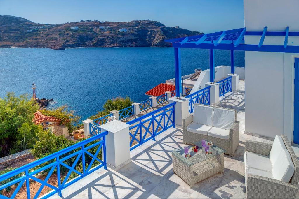 a view of the ocean from a house at Syros Private House with superb sea view in Kinion