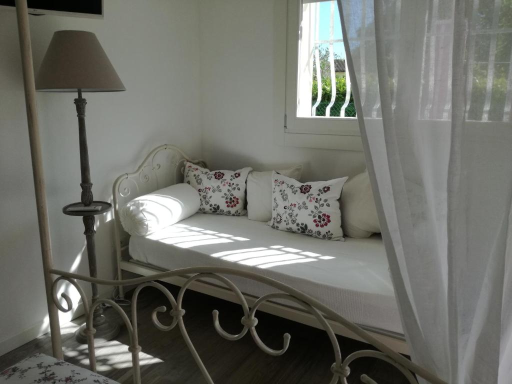 Postel nebo postele na pokoji v ubytování B&B Nadine