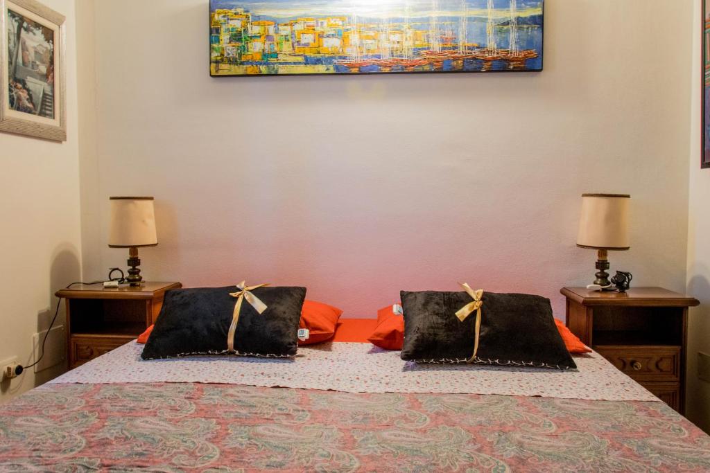 Postel nebo postele na pokoji v ubytování B&B Ca'neva