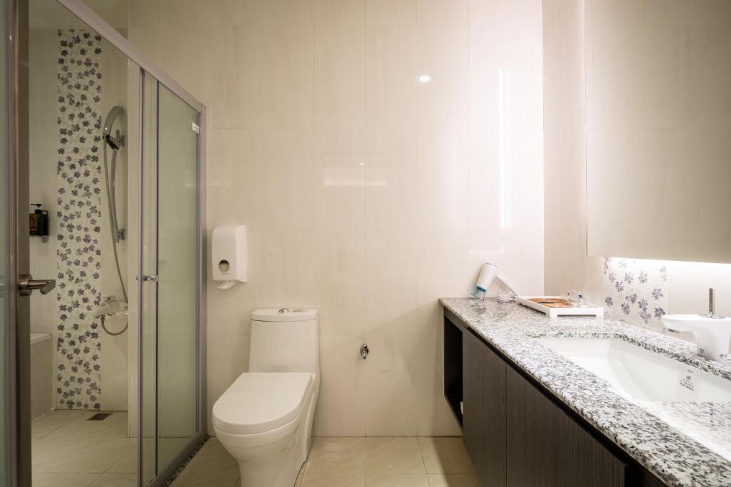 Koupelna v ubytování Midu Business Hotel