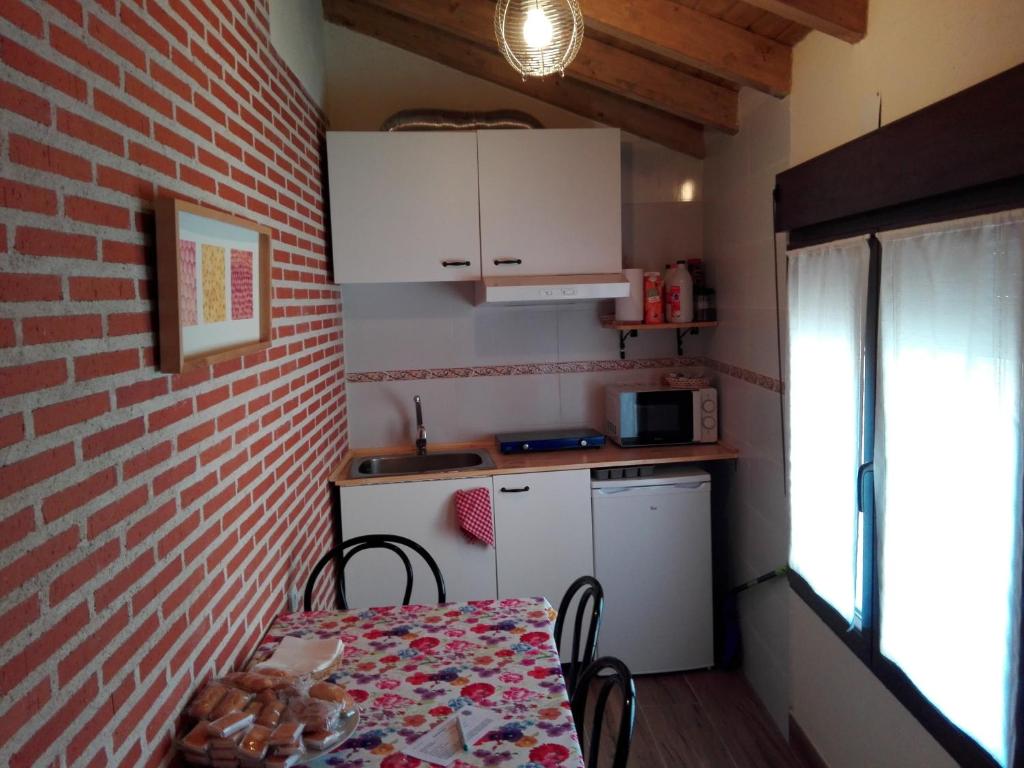 A kitchen or kitchenette at Abadía del Marqués de Avila