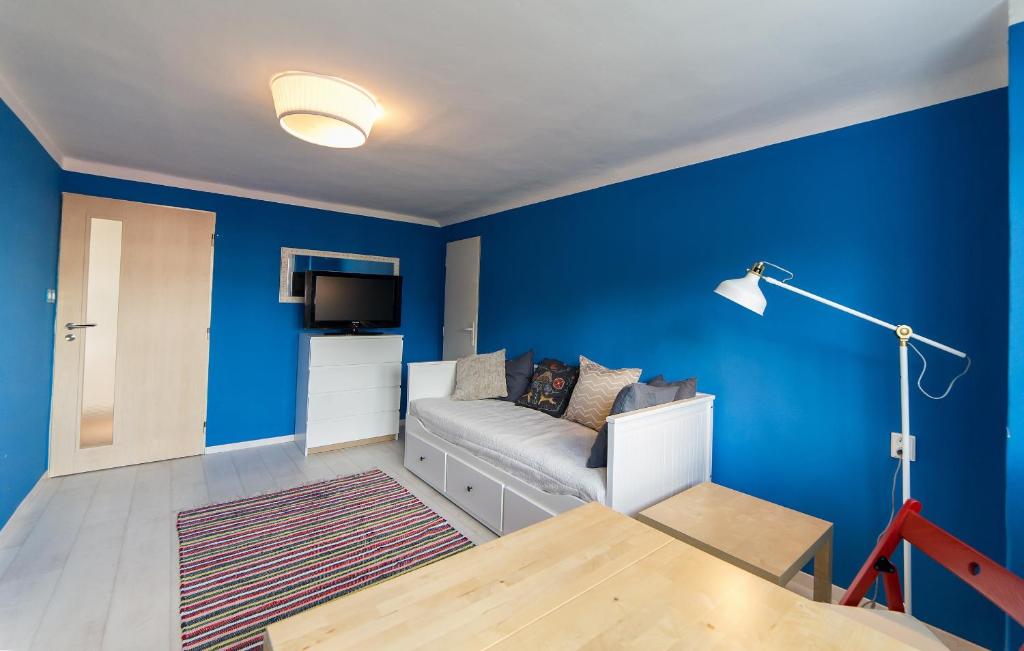 Telewizja i/lub zestaw kina domowego w obiekcie Villa Cihelna apartments