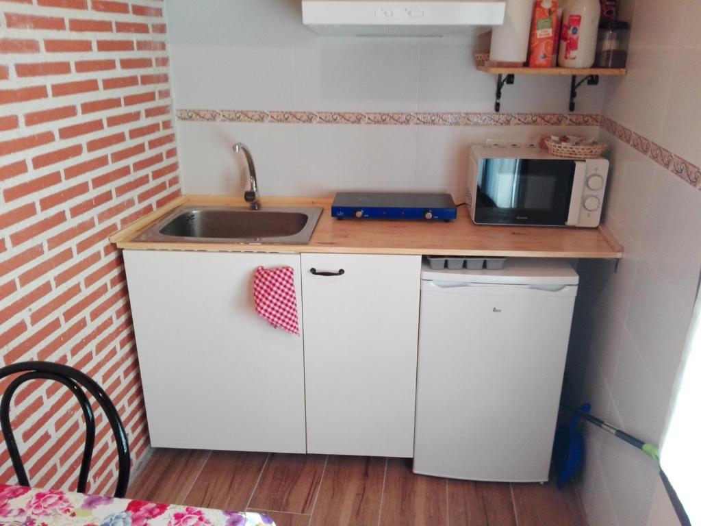A kitchen or kitchenette at Abadía del Marqués de Avila