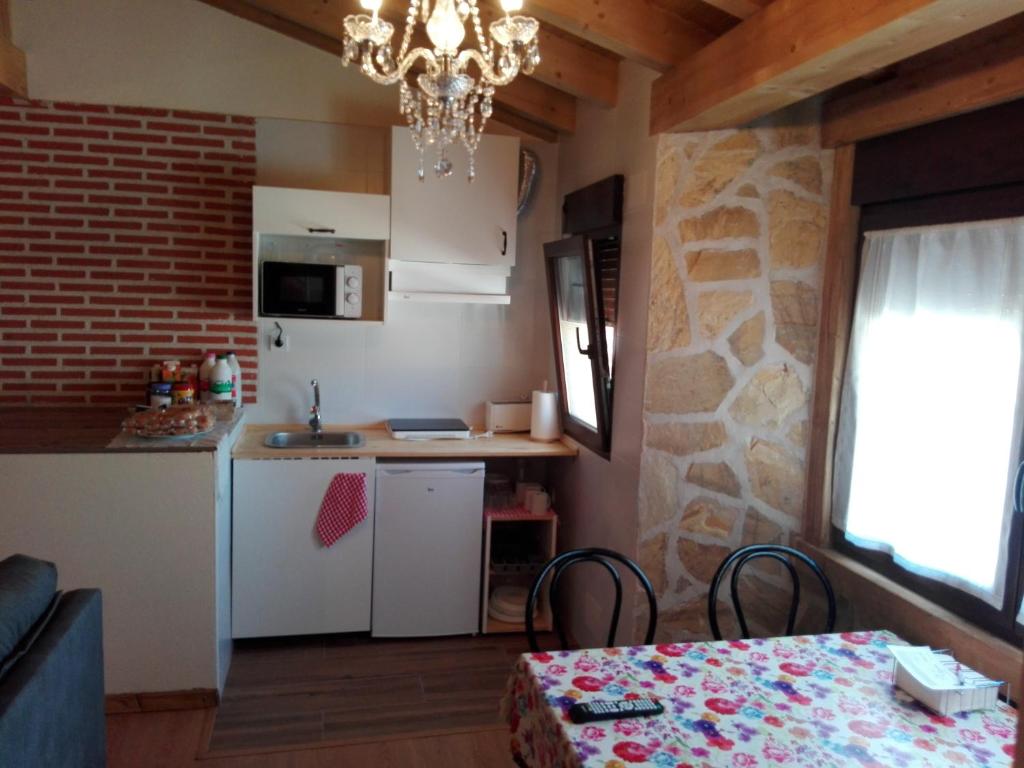A kitchen or kitchenette at Abadía del Marqués de Avila
