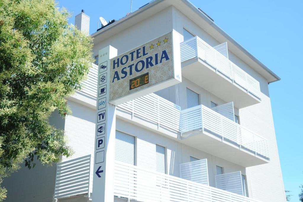 a hotel astoria sign in front of a building at Hotel Astoria in Ravenna