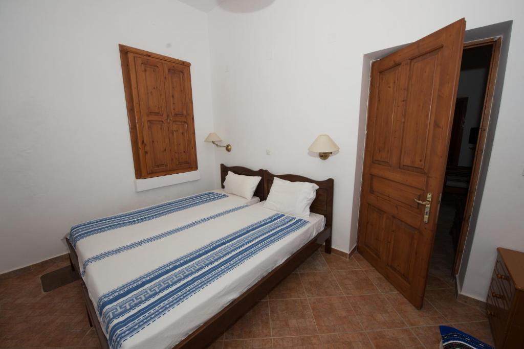 Postel nebo postele na pokoji v ubytování Villa Zeus