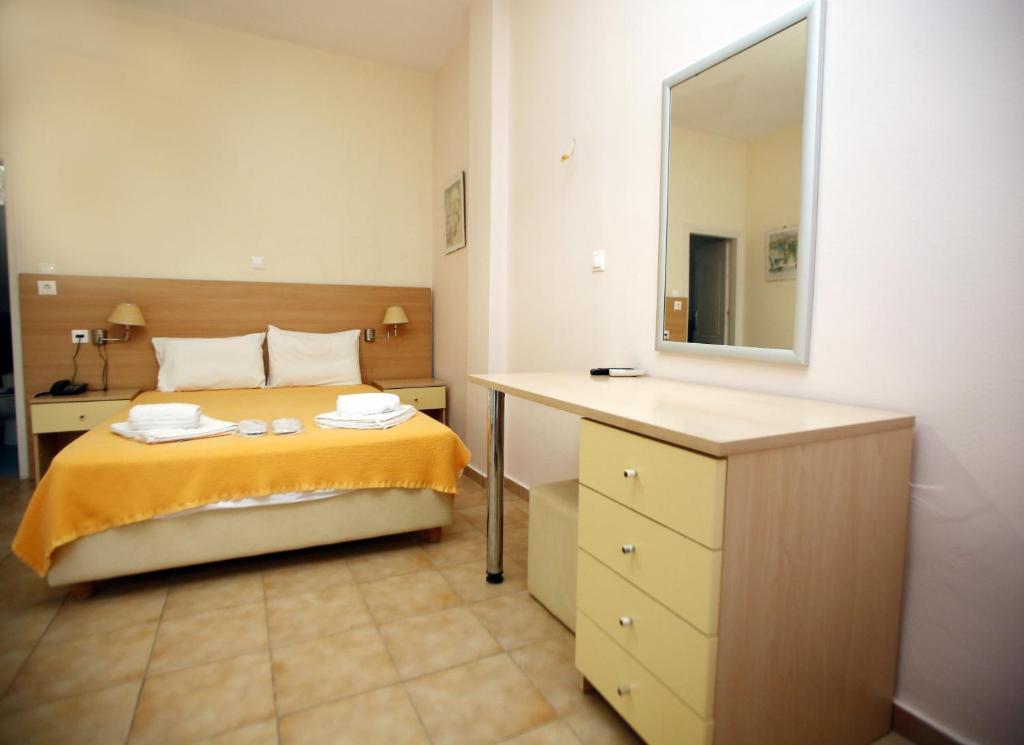 Voodi või voodid majutusasutuse Aggelos Hotel toas