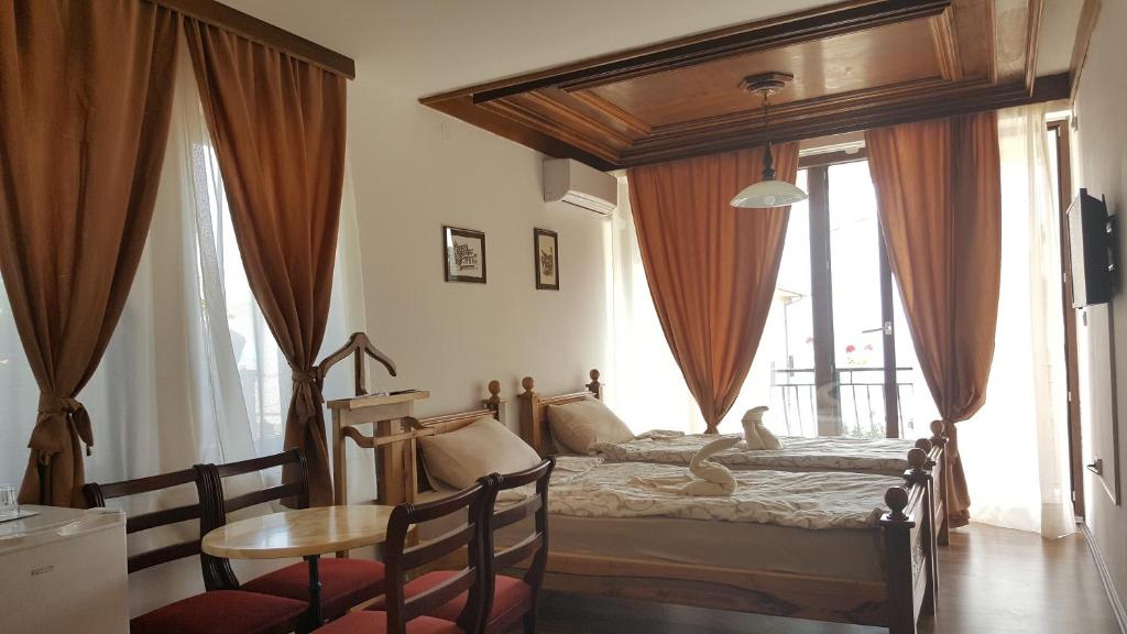 Ein Bett oder Betten in einem Zimmer der Unterkunft Villa Srma