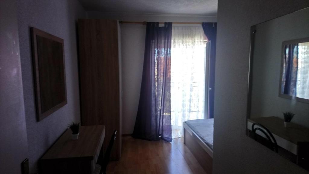 TV a/nebo společenská místnost v ubytování Apartmani Five