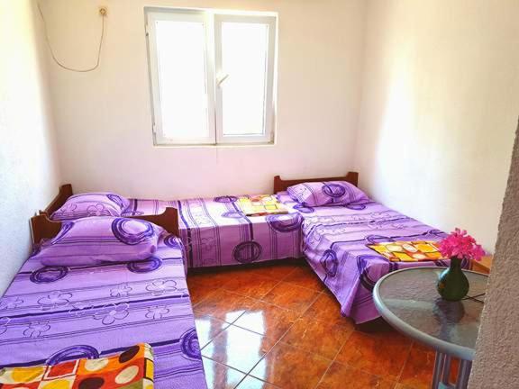 Posteľ alebo postele v izbe v ubytovaní Guesthouse Berlin