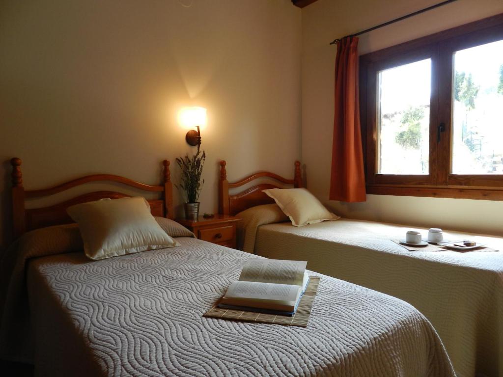 Postel nebo postele na pokoji v ubytování Apartaments El Tossalet