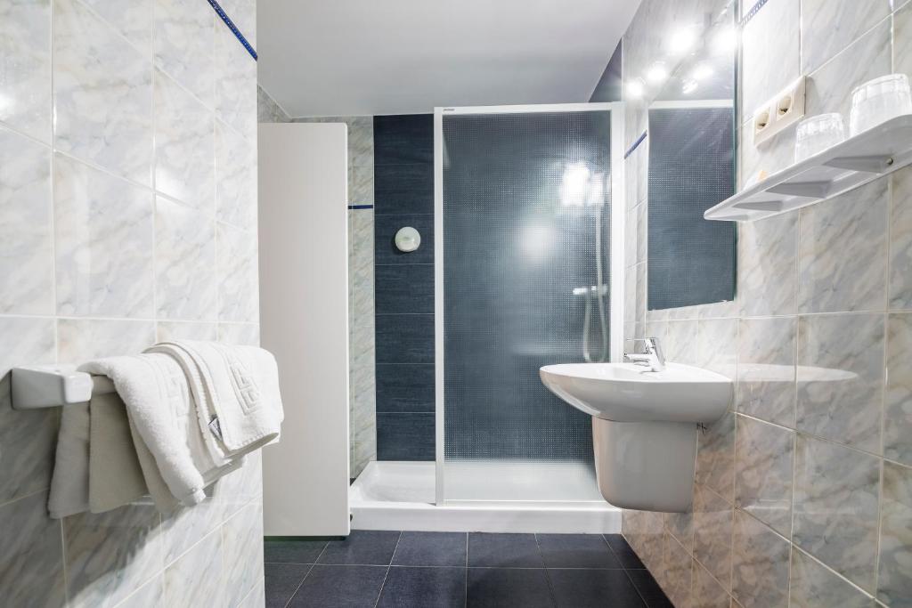 Koupelna v ubytování Hotel Blason Junior