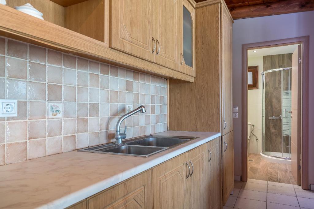 A kitchen or kitchenette at Fiore Beach Studios