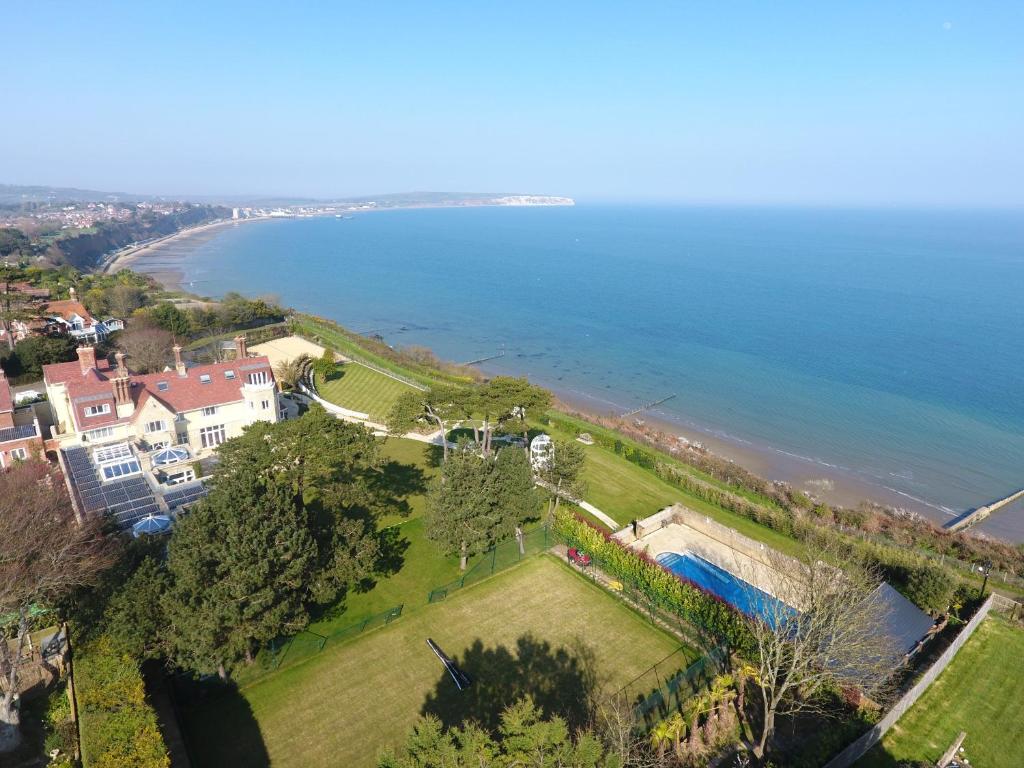 an aerial view of a house next to the ocean at Haven Hall Hotel in Shanklin
