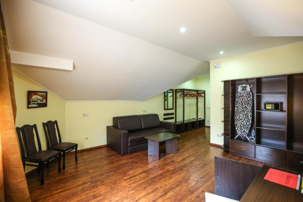 Posezení v ubytování Home Hotel