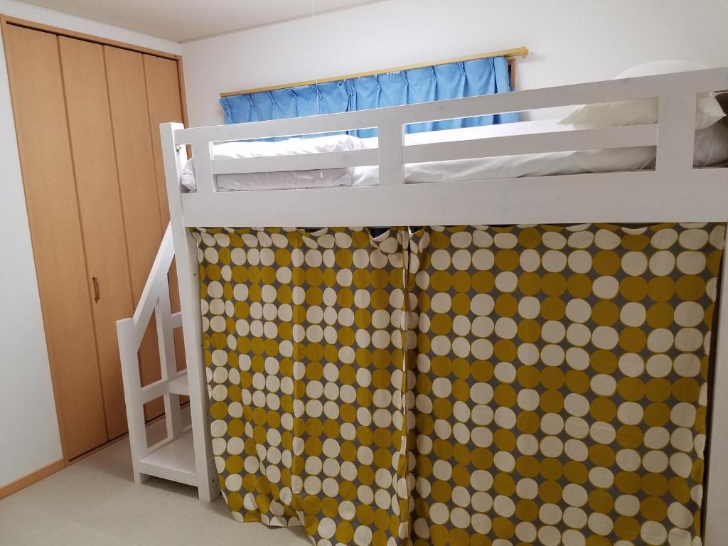 Postel nebo postele na pokoji v ubytování Villa M Guesthouse