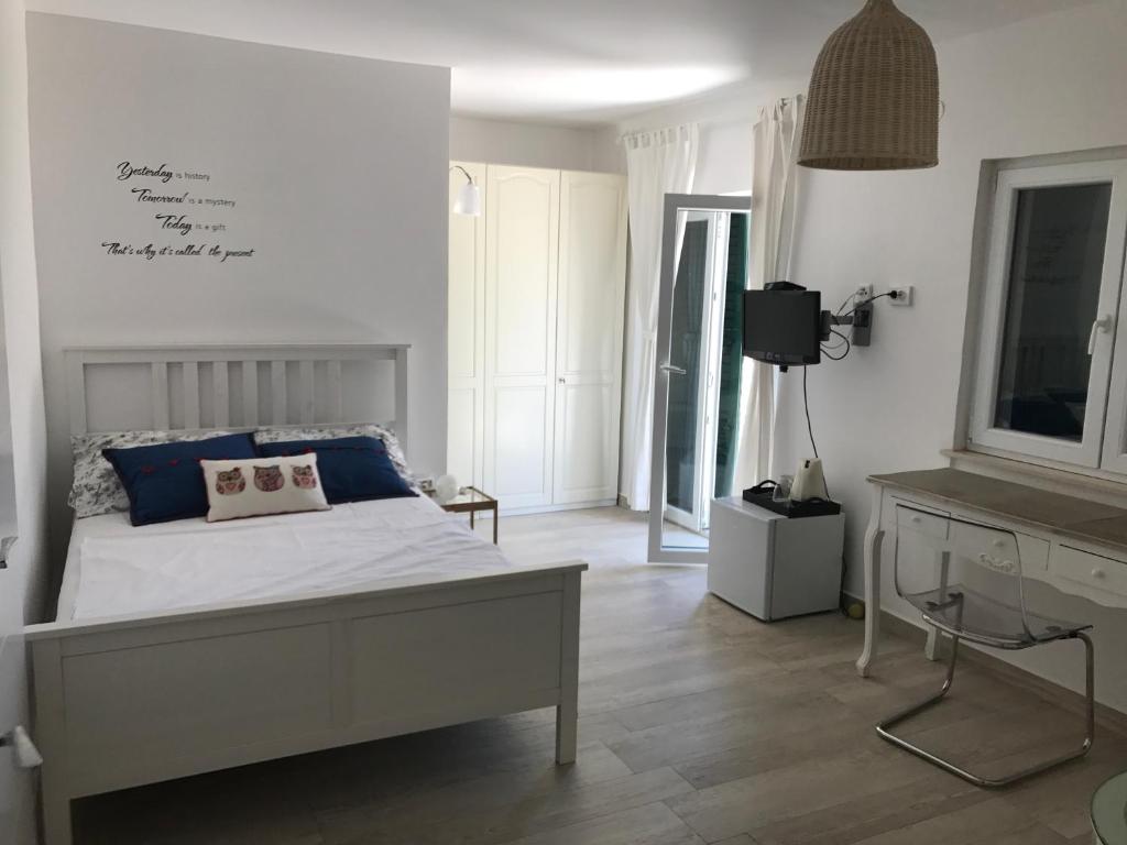 Postel nebo postele na pokoji v ubytování Guesthouse Davorka Bijelić