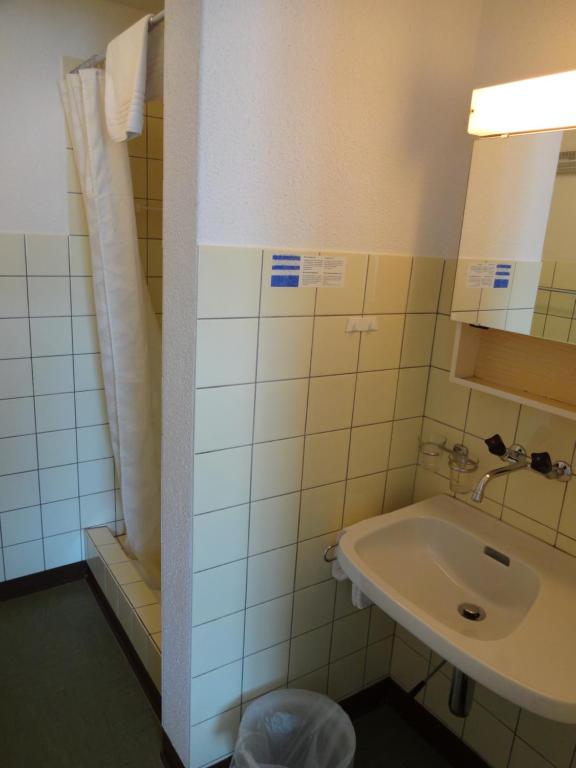 Koupelna v ubytování Hotel Schweizerhof