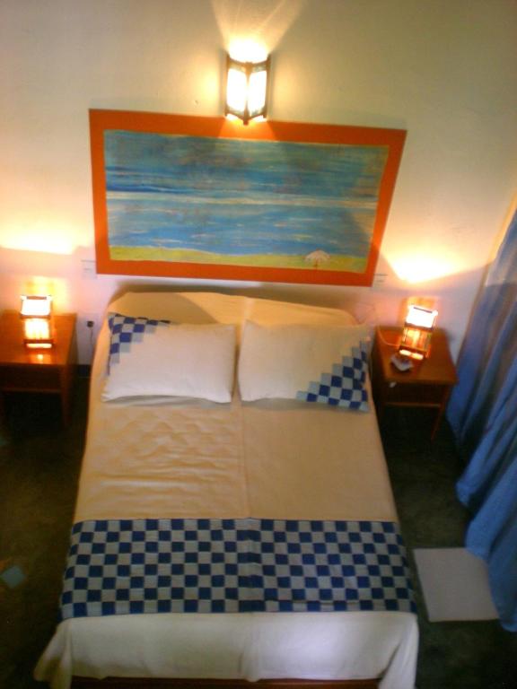 Postel nebo postele na pokoji v ubytování Art Hotel Aos Sinos Dos Anjos
