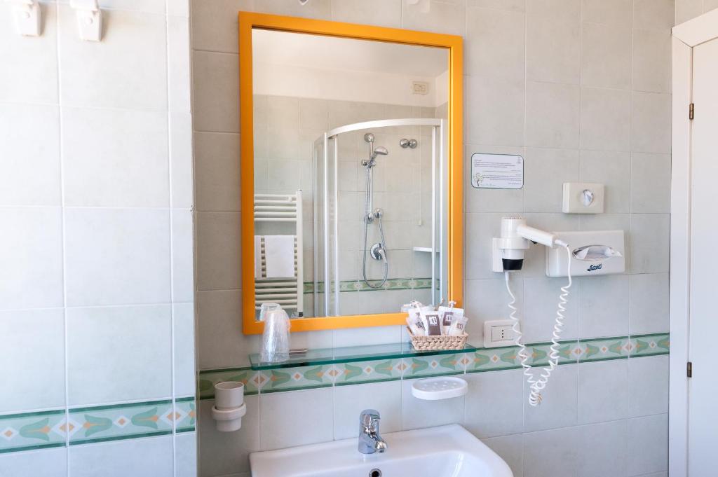 Ванная комната в Hotel Brigantino Non Dista